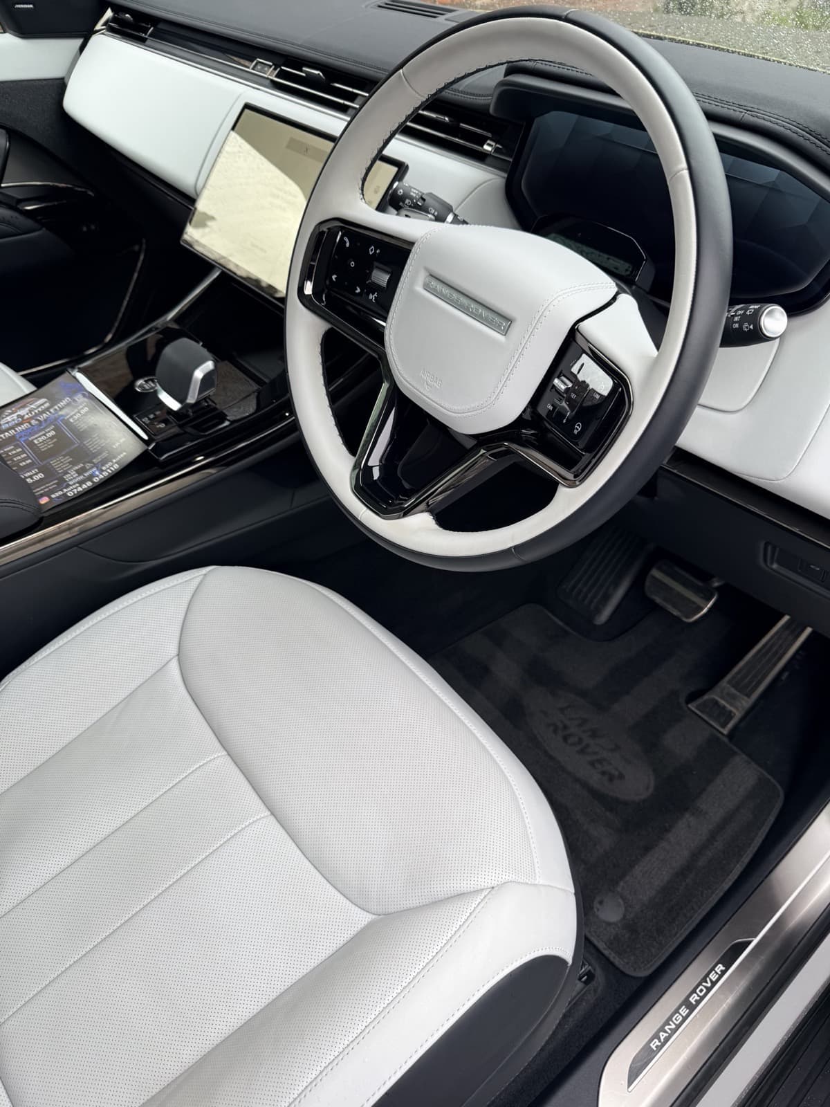 White leather cabin and steering wheel after a full valet
