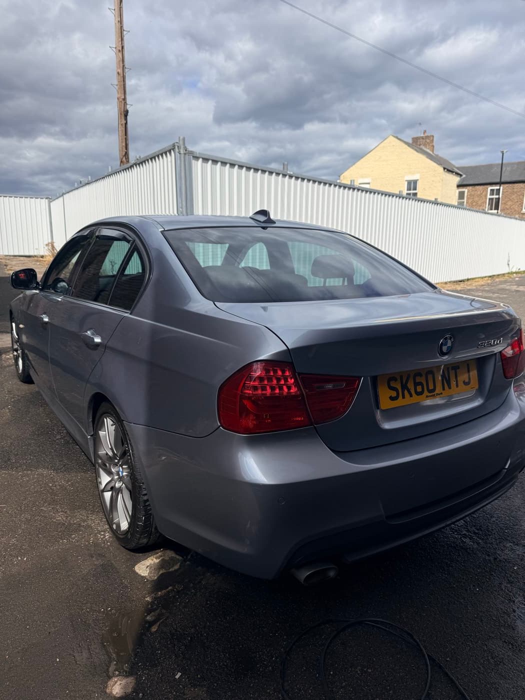 The same BMW washed, the paint and wheels clean